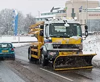 grit spreading on public road